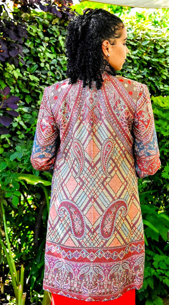 Paisley-dapple cashmere-silk jacket in browns, pinks and turquoise, nehru collar, handwoven, fully lined, Nelly in garden, rear view jacket details