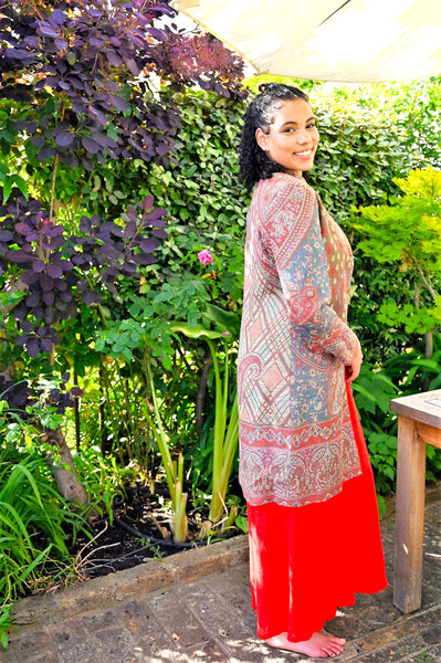 Paisley-dapple cashmere-silk jacket in browns, pinks and turquoise, nehru collar, handwoven, fully lined, Nelly in garden, side and back view
