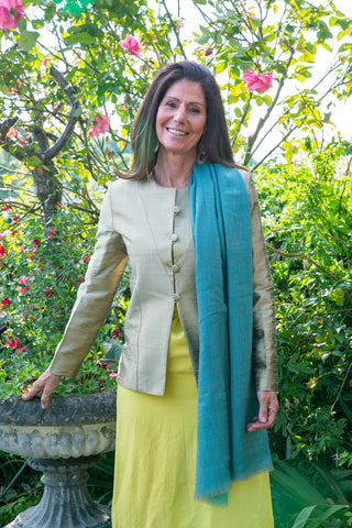 Pale Gold Raw Silk Jacket with pure vicuna herringbone scarf in turquoise, modelled by Stavia
